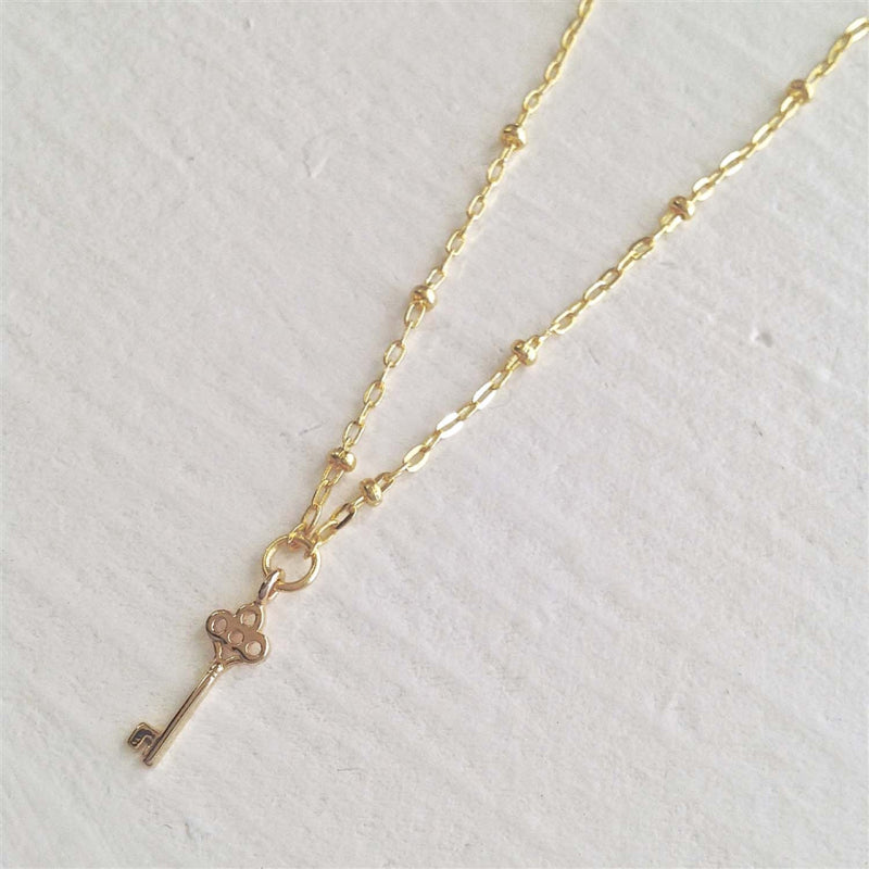 Collier Pika & Bear « Minerva » avec mini-breloque Clé en or