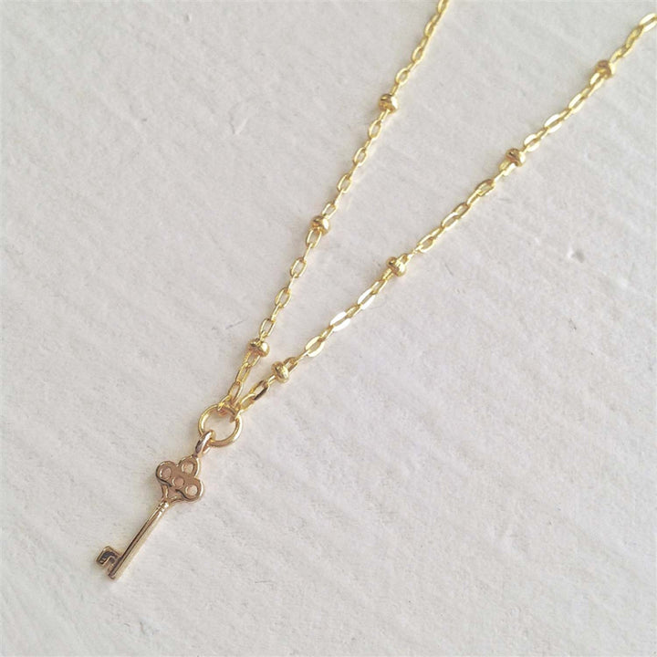Collier Pika & Bear « Minerva » avec mini-breloque Clé en or