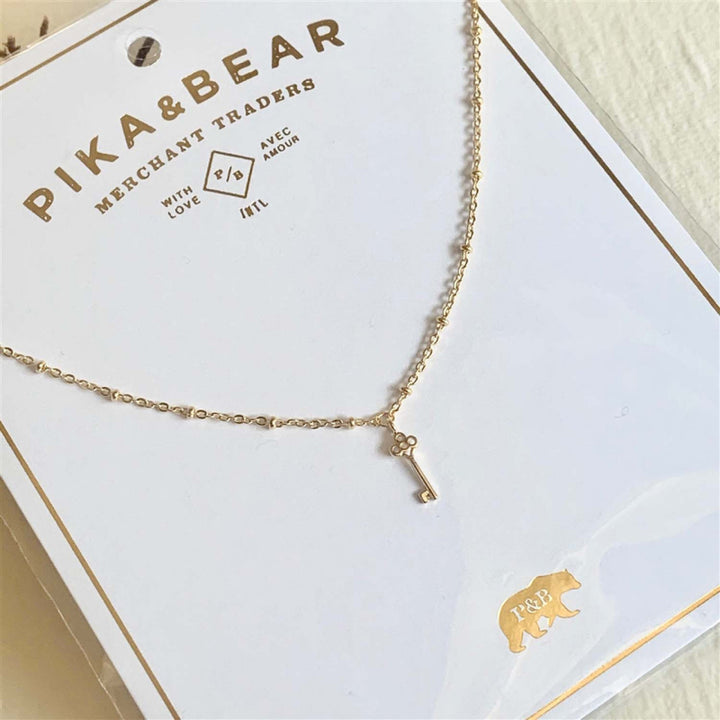 Collier Pika & Bear « Minerva » avec mini-breloque Clé en or