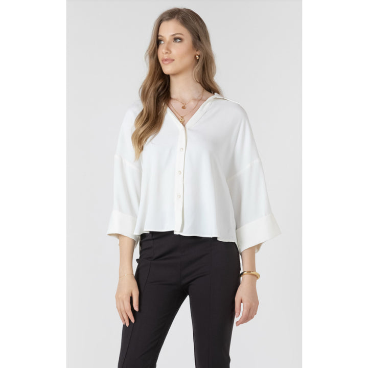 Chemisier boutonné avec revers en galon noir