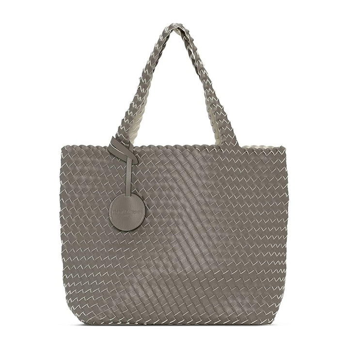 Gray woven handbag with a circular tag on a white background